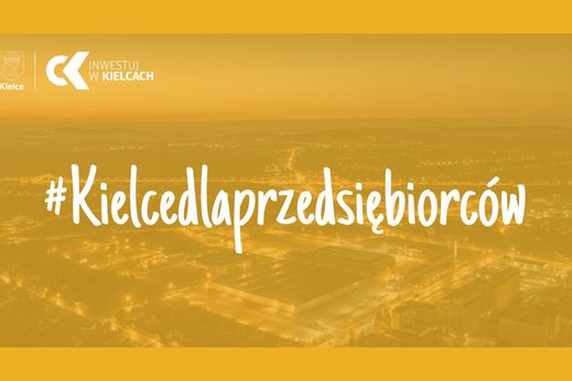 Kielce z lotu ptaka. Napis #Kielce dla przedsiębiorców (żółty).